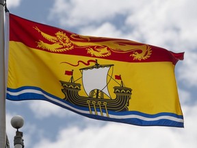 Public Health officials in New Brunswick are reporting two new cases of COVID-19 today. New Brunswick's provincial flag flies on a flag pole in Ottawa, Friday, July 3, 2020.