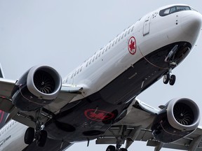 An Air Canada Boeing 737 Max 8 aircraft arriving from Toronto prepares to land at Vancouver International Airport, in Richmond, B.C., Tuesday, March 12, 2019. Transport Minister Marc Garneau says Boeing's Max 8 aircraft won't be allowed to fly in Canadian skies until officials believe all safety concerns have been addressed.