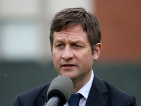 B.C. Minister of Education Rob Fleming provides an update on part-time return to classes during a press conference at Monterey Middle School in Victoria, Tuesday, June 2, 2020. A group of COVID-19 modellers says the British Columbia government should increase physical distancing measures to help it more safely reopen schools next month.