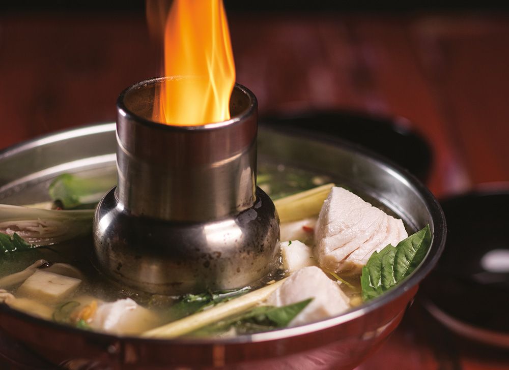 Cook this Hot sour soup of halibut and Thai basil from Maenam