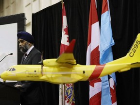 Defence Minister Harjit Sajjan announces that the federal government of Canada will spend $2.3 billion to replace the military's ancient search-and-rescue planes with 16 new aircraft from European aerospace giant Airbus that at CFB Trenton in Trenton, Ont., on December 8, 2016. The Royal Canadian Air Force will fly its ancient search-and-rescue planes longer than expected as COVID-19 further delays the delivery of replacement aircraft. Defence officials are playing down any significant impact from the latest delay, which has left the first new search-and-rescue plane built by Airbus stranded in Spain.
