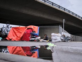 A homeless camp under an overpass in Calgary on May 20, 2020, amid a worldwide COVID-19 pandemic. The Alberta government has announced $48 million in funding for shelters and community organizations that have been serving homeless people during the COVID-19 pandemic. The money is on top of $25 million announced in March.