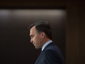 Minister of Finance Bill Morneau announces his resignation during a news conference on Parliament Hill in Ottawa, on Monday, Aug. 17, 2020.
