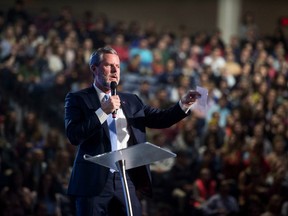 In this Wednesday, Nov. 1, 2017 file photo, Liberty University President Jerry Falwell Jr. speaks at convocation at Liberty University in Lynchburg, Va. On Aug. 7, 2020, Falwell stepped down, at least temporarily, from his role as the president of the school.