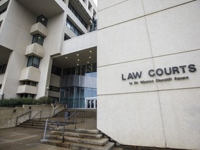Edmonton Law Courts are shown in Edmonton on Wednesday, July 8, 2020. A sentencing hearing for a man who has admitted to punching and killing an Edmonton flower store owner has heard from grieving family members and friends.
