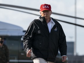 President Donald Trump gives thumbs up while walking to Air Force One upon departure at Chennault International Airport, Saturday, Aug. 29, 2020, in Lake Charles, La. U.S. president Donald Trump's administration has launched an election-year trade probe to look at the impact of Canada's lobster exports on the American industry.