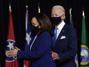 Democratic presidential nominee Joe Biden and vice presidential running mate, U.S. Senator Kamala Harris, arrive to conduct their first press conference together in Wilmington, Delaware, on Aug. 12, 2020.