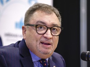 Dr. Horacio Arruda, Quebec's director of public health, addresses a news conference in Montreal, on Friday, Aug. 7, 2020.