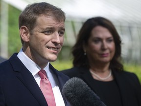 Newfoundland and Labrador Premier Andrew Furey and his Deputy Premier and Finance Minister Siobahn Coady speak with the media following the swearing in ceremony of his cabinet on the grounds of Government House in St. John's on Wednesday, August 19, 2020.