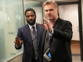 Writer/director Christopher Nolan on the set of Tenet with star John David Washington.