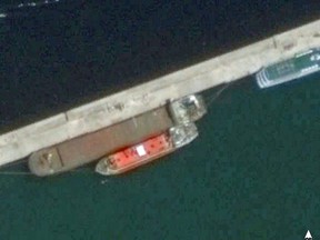 An aerial view of what may be the MV Rhosus, the larger cargo ship,  in the port of Beirut on May 2014.