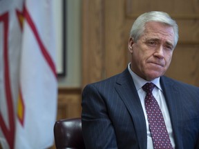 Newfoundland and Labrador Premier Dwight Ball poses in his office at the Confederation Building in St. John's on Tuesday, February 18, 2020. Newfoundland and Labrador's 14th premier will be announced Monday at a party leadership convention that has forced organizers to get creative with pandemic restrictions on crowds. Online and telephone voting began this week to elect the next leader of the Liberal Party of Newfoundland and Labrador, with 34,000 people eligible to cast figurative ballots for one of two men in the running to replace Ball.THE CANADIAN PRESS/Paul Daly