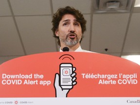 Prime Minister Justin Trudeau holds a press conference as he visits the Public Health Agency of Canada during the COVID-19 pandemic in Ottawa on Friday, July 31, 2020.