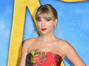 In this file photo US singer Taylor Swift arrives for Universal Pictures' world premiere of "Cats" at Alice Tully Hall on December 16, 2019 in New York City.
