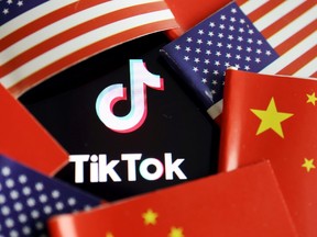 China and U.S. flags are seen near a TikTok logo in this illustration picture taken July 16, 2020.