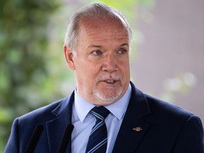 British Columbia Premier John Horgan speaks during an announcement about a new regional cancer centre, in Surrey, B.C., on Thursday, August 6, 2020.