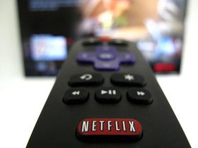 The Netflix logo is pictured on a television remote in this illustration photograph taken in Encinitas, California, U.S., January 18, 2017.