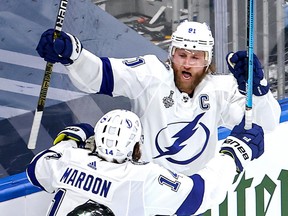 Tampa Bay Lightning captain Steven Stamkos is congratulated by Pat Maroon after scoring against the Dallas Stars during the first period in Game 3 of the Stanley Cup final Wednesday at Rogers Place in Edmonton.