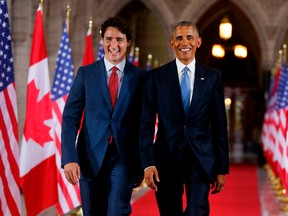 Prime Minister Justin Trudeau, left, and U.S. President Barack Obama exit the Hall of Honour on Parliament Hill following the North American Leaders Summit in Ottawa, in 2016.