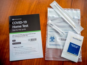 The contents of a U.K. government COVID-19 antigen home test kit.