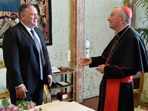 The Vatican's Secretary of State, Italian Cardinal Pietro Parolin (R) meeting with US Secretary of State Mike Pompeo on October 1, 2020 in The Vatican.