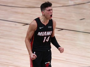 Miami Heat guard Tyler Herro (14) celebrates after a layup against the Boston Celtics during the second half of game four of the Eastern Conference Finals of the 2020 NBA Playoffs at AdventHealth Arena, Sep 23, 2020, Florida, USA.