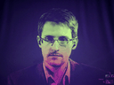 Whistleblower Edward Snowden speaks to European officials via videoconference while in exile, June 24, 2014.