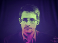 Whistleblower Edward Snowden speaks to European officials via videoconference while in exile, June 24, 2014.