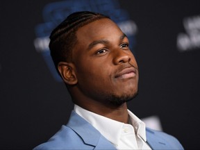 English actor John Boyega arrives for the world premiere of Disney's "Star Wars: Rise of Skywalker" at the TCL Chinese Theatre in Hollywood, California on December 16, 2019.