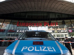 A police car in front of the Limbecker Platz shopping centre in Essen, western Germany, March 11, 2017. Dozens of officers deployed in the city of Essen were asked to hand in their badges and weapons Wednesday.