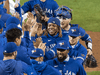Toronto Blue Jays players celebrate after clinching a playoff spot following a victory over the New York Yankees on September 24, 2020.
