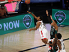 Toronto Raptors guard Kyle Lowry makes a layup against Boston Celtics forward Grant Williams during game two of their NBA playoff series, Sep. 1, 2020.