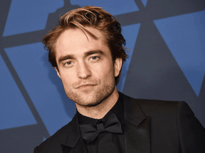 Actor Robert Pattinson, pictured in October 2019, has reportedly tested positive for COVID-19 while on set of The Batman.