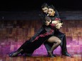 Valentin Arias Delgado and Diana Franco Durango of Colombia perform during the Tango Stage competition final of the 16th Tango Dance World Championship in Buenos Aires on Aug. 22, 2018.