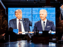 People watch the first televised presidential debate between Donald Trump and Joe Biden at a sports bar in Washington, D.C., on Sept. 29, 2020.