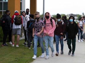 Students return to school at Mother Margaret Mary Catholic High School amid the COVID-19 pandemic, in Edmonton on Sept. 2.