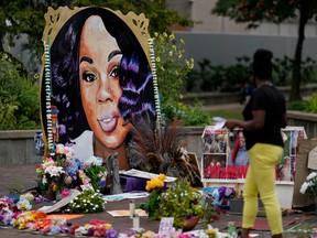 A woman visits the memorial for Breonna Taylor in Louisville, Kentucky, U.S., September 11, 2020.