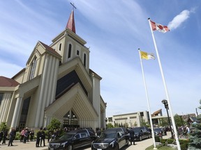 A service is held at St. Eugene De Mazenod Catholic Church in Brampton.