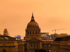 San Francisco City Hall is shrouded in smoke from multiple wildfires burning in the Sierra Nevada and Coast Ranges of Northern California, Wednesday morning, Sept. 9, 2020. Air quality throughout the West was heavily impacted.