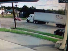 A truck and trailer are shown in this RCMP handout image. People may have found it odd when thieves made off with truckoads of hot tubs and beef within days of each other in rural Alberta, but the Insurance Bureau of Canada says it highlights a growing type of crime perpetrated by sophisticated culprits.