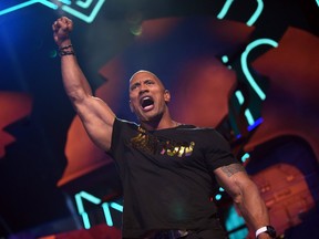 Host Dwayne Johnson speaks onstage during the 2016 MTV Movie Awards at Warner Bros. Studios on April 9, 2016 in Burbank, California.