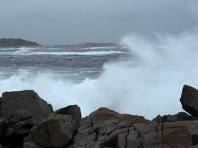 Waves crash into the shore before the arrival of Hurricane Teddy in Peggy's Cove, Nova Scotia, Canada September 22, 2020.