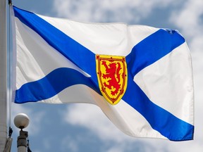 Nova Scotia's provincial flag flies on a flag pole in Ottawa on July 3, 2020. An appeal hearing is to be held today as a Nova Scotia woman tries to stop her husband's plan for a medically assisted death.