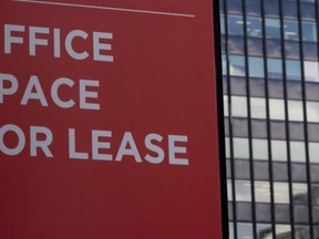 A sign advertises office space available for rent in Ottawa's downtown core in Ottawa, Monday, Aug. 31, 2020. Canadians should brace for a shortage of office furniture, such as desks and chairs, as people continue to study and work from home this fall.