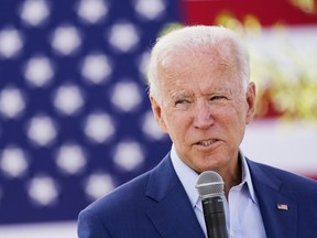 Democratic U.S. presidential nominee Joe Biden speaks to attendees at an outdoor "Black Economic Summit" while campaigning for president in Charlotte, North Carolina, U.S., Sept. 23, 2020.