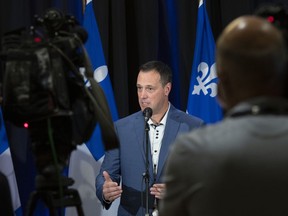 Quebec Education Minister Jean-Francois Roberge speaks on COVID-19 measures in schools at a news conference, Friday, September 11, 2020 at the legislature in Quebec City.
