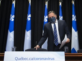 Quebec Premier Francois Legault arrives at a news conference on the COVID-19 pandemic at the National Assembly in Quebec City, Tuesday, Sept. 15, 2020.