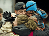 A Canadian soldier greets his family after returning from Afghanistan.