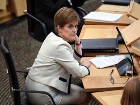 First Minister of Scotland Nicola Sturgeon attends a session in which she delivered her Programme For Government statement in the debating chamber of the Scottish Parliament in Edinburgh on September 1, 2020