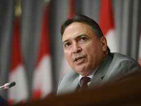 Perry Bellegarde, National Chief of the Assembly of First Nations, takes part in an event on Parliament Hill in Ottawa on Tuesday, July 7, 2020, to sign a protocol agreement to advance First Nations' exercise of jurisdiction over child and family services. Indigenous children and their relatives harmed by chronic underfunding of child-welfare services on reserves are a step closer to resolving claims for compensation.